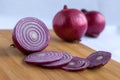 Fresh red onion, on a chopped board Royalty Free Stock Photo